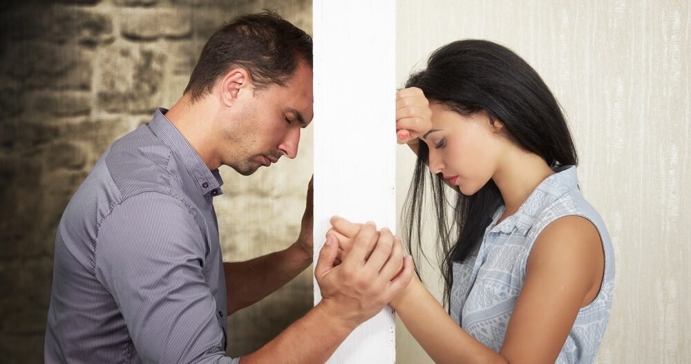 Couple holding hands